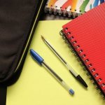 Notebook pens and briefcase